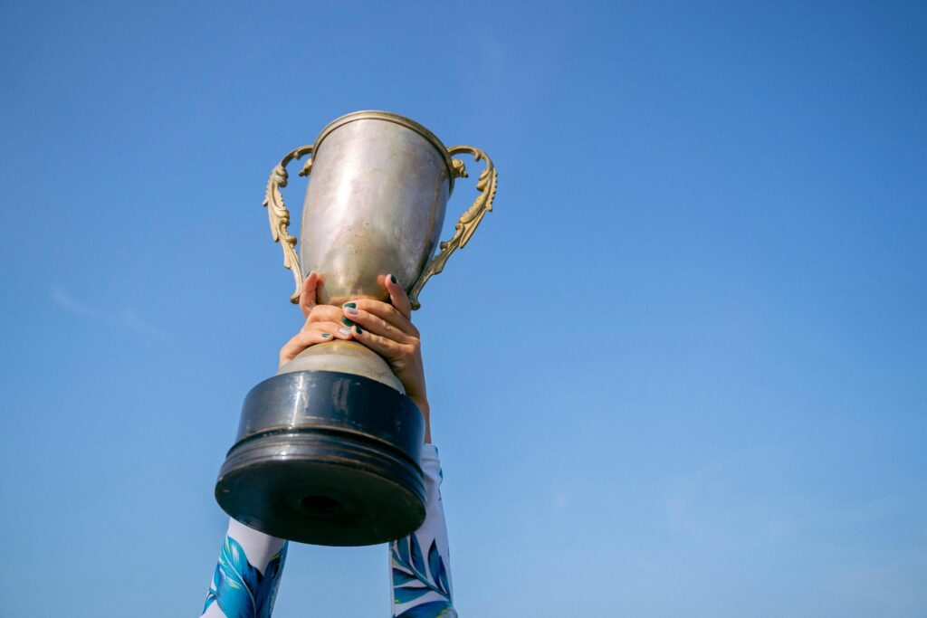 Hands Holding a Trophy