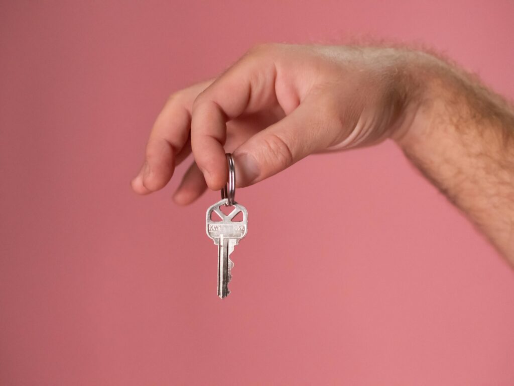 Hand Holding a Key