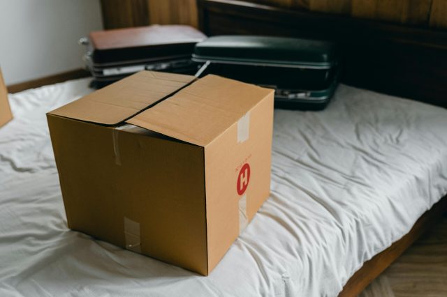 a moving box on a bed